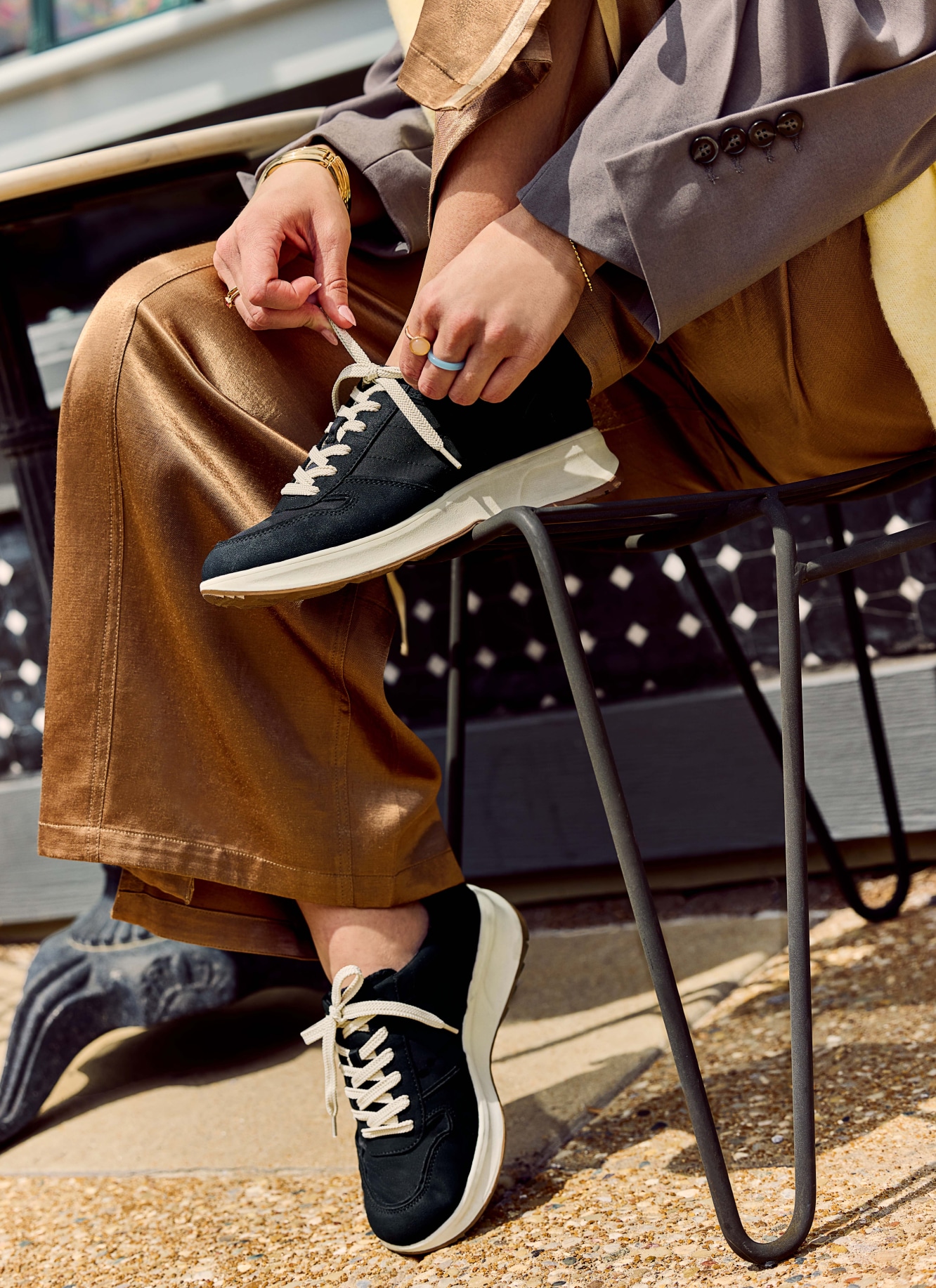 lace up sneakers being tied