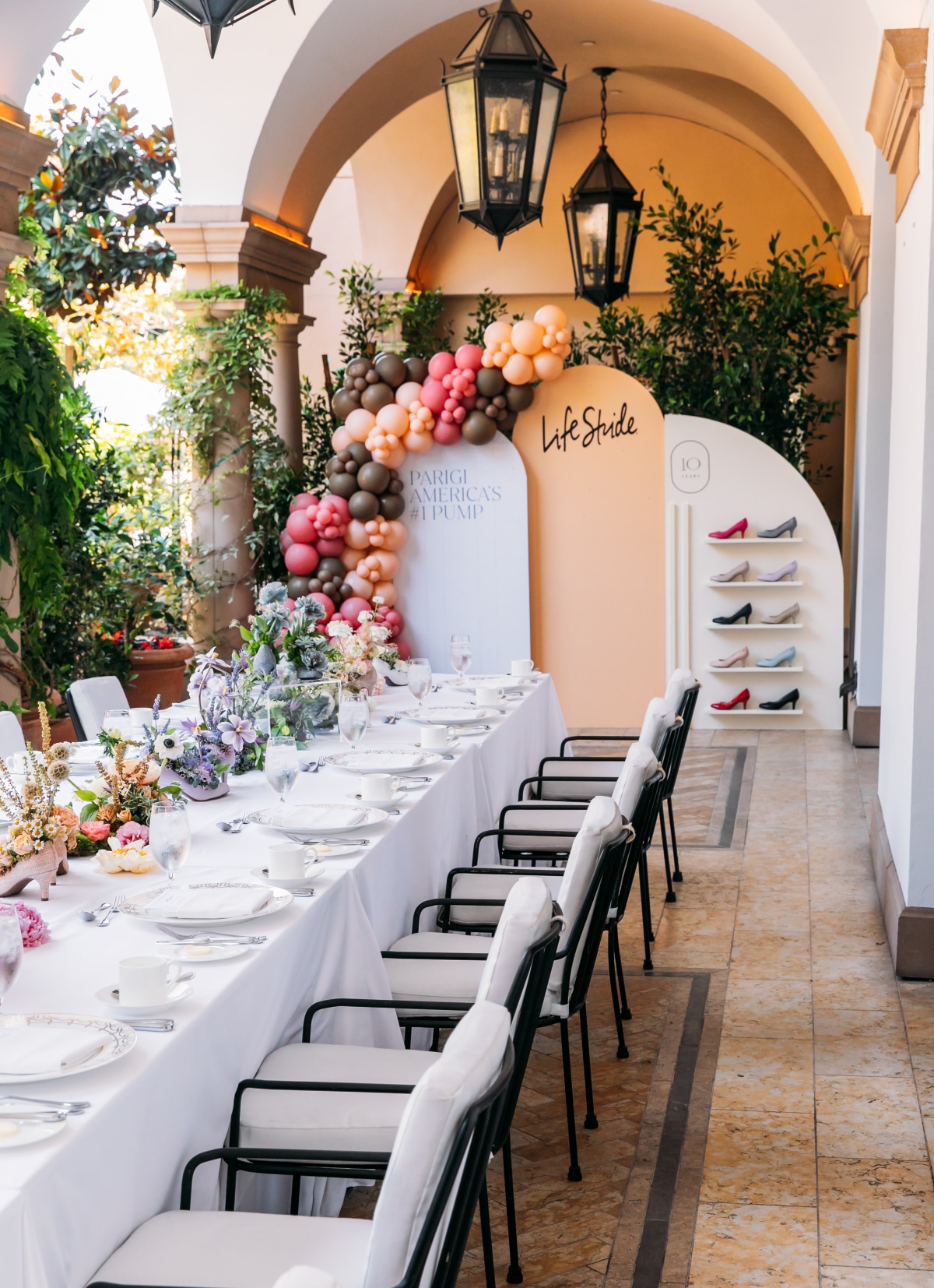 An Instagram-worthy balloon backdrop and gorgeous florals adorned the tables of the Parigi brunch.