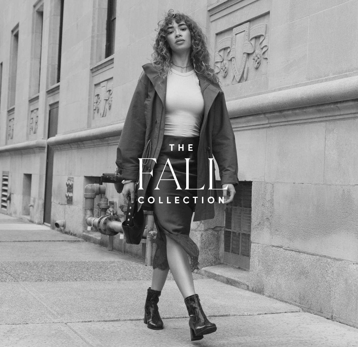 black and white picture of a woman walking on the sidewalk wearing Lifestride booties. white text centered in the image reads 