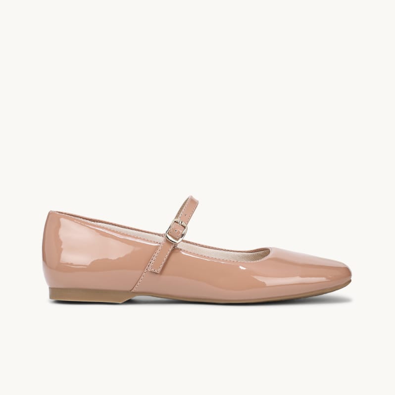 Sideview of a women's Mary Jane flat in Desert Nude Patent Leather.