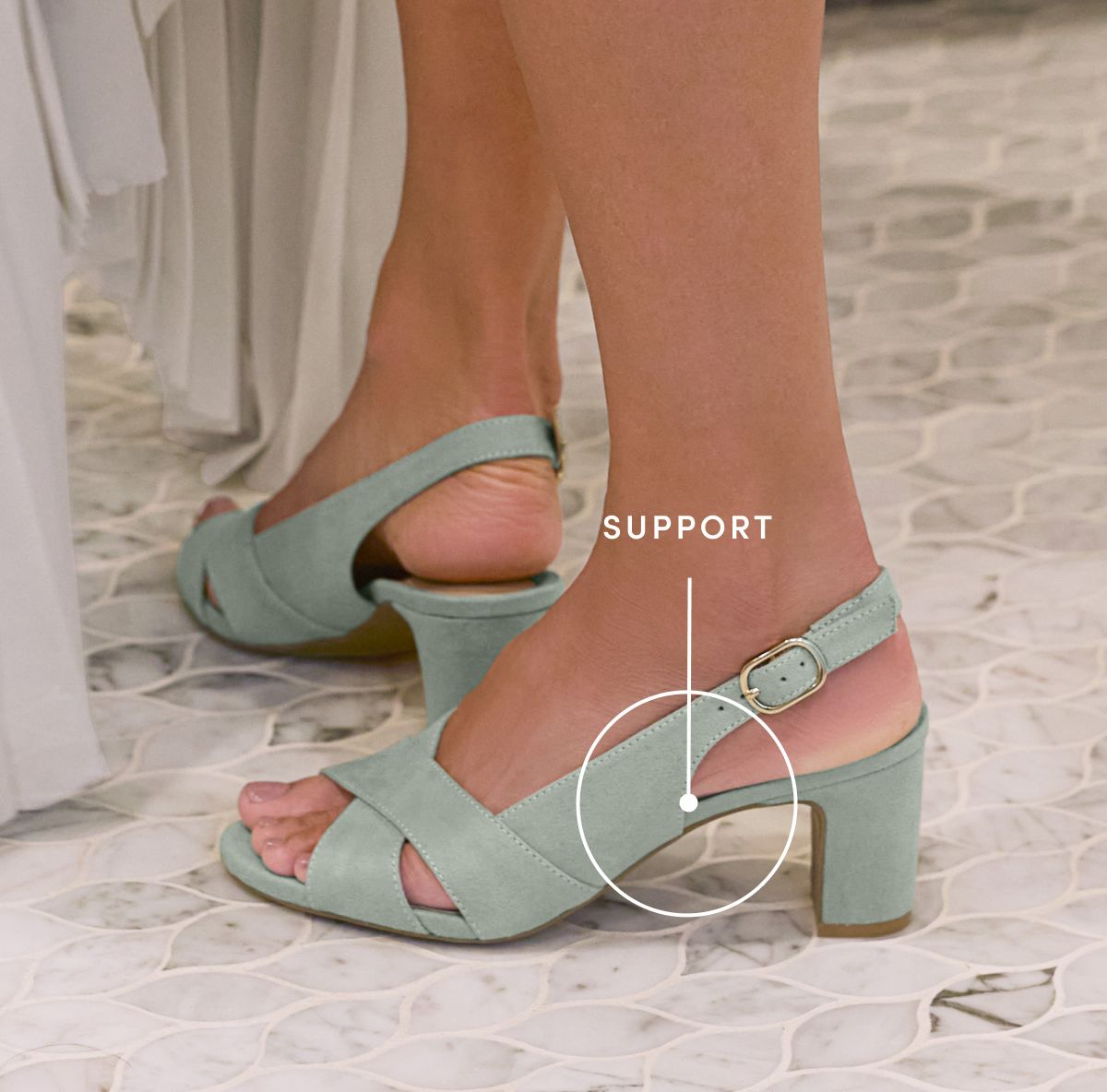 A model wearing jade green LifeStride heels with the support highighted 