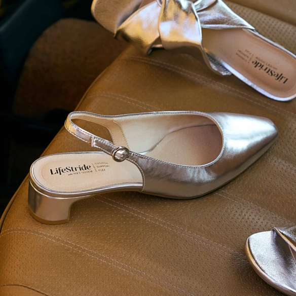 A photo of a model wearing LifeStride Abby heels