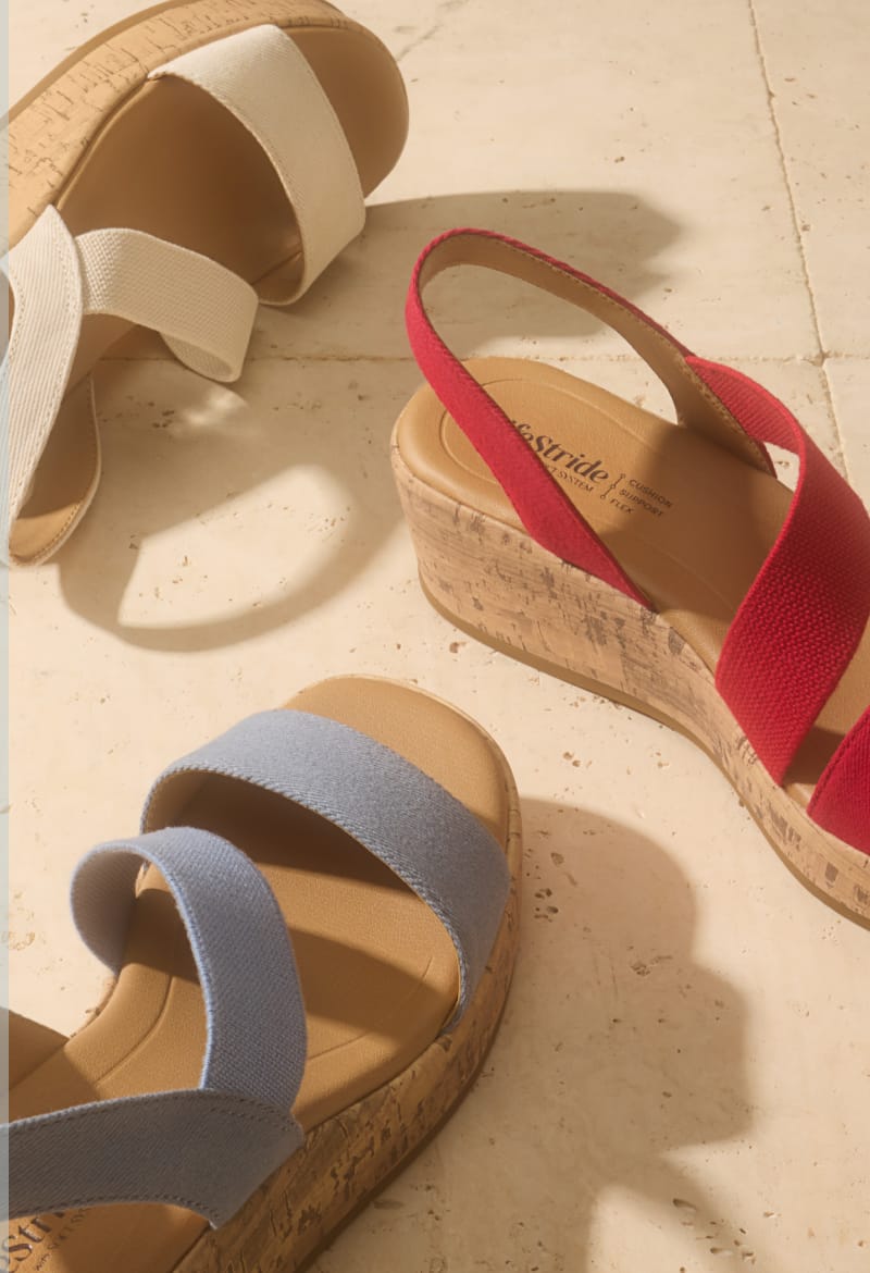 Three Lifestride women's wedge sandals in red, white, and blue.